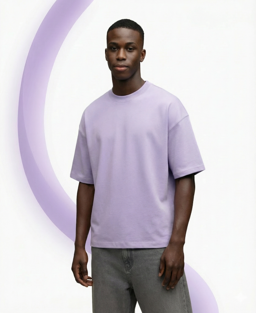 Man wearing a light purple t-shirt against a white background
