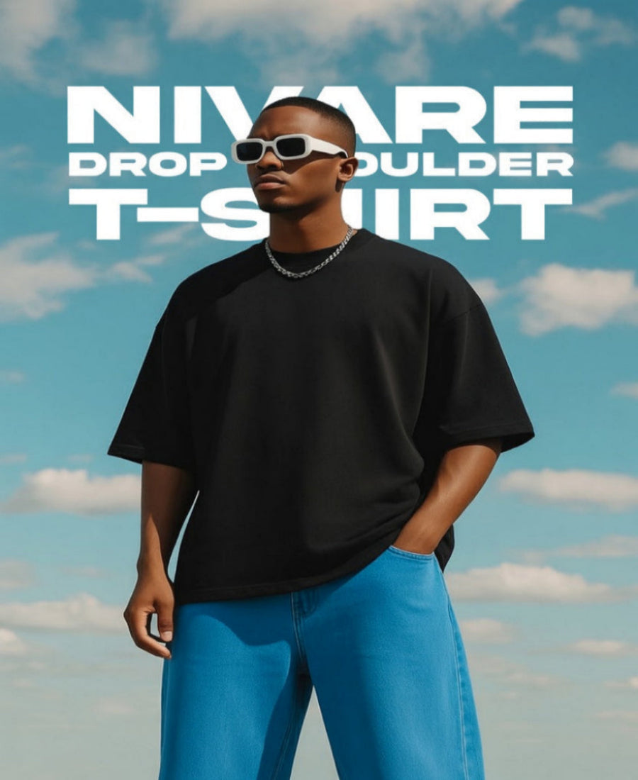 Person wearing a black t-shirt and blue pants with 'Nivare' text overlay against a cloudy sky.